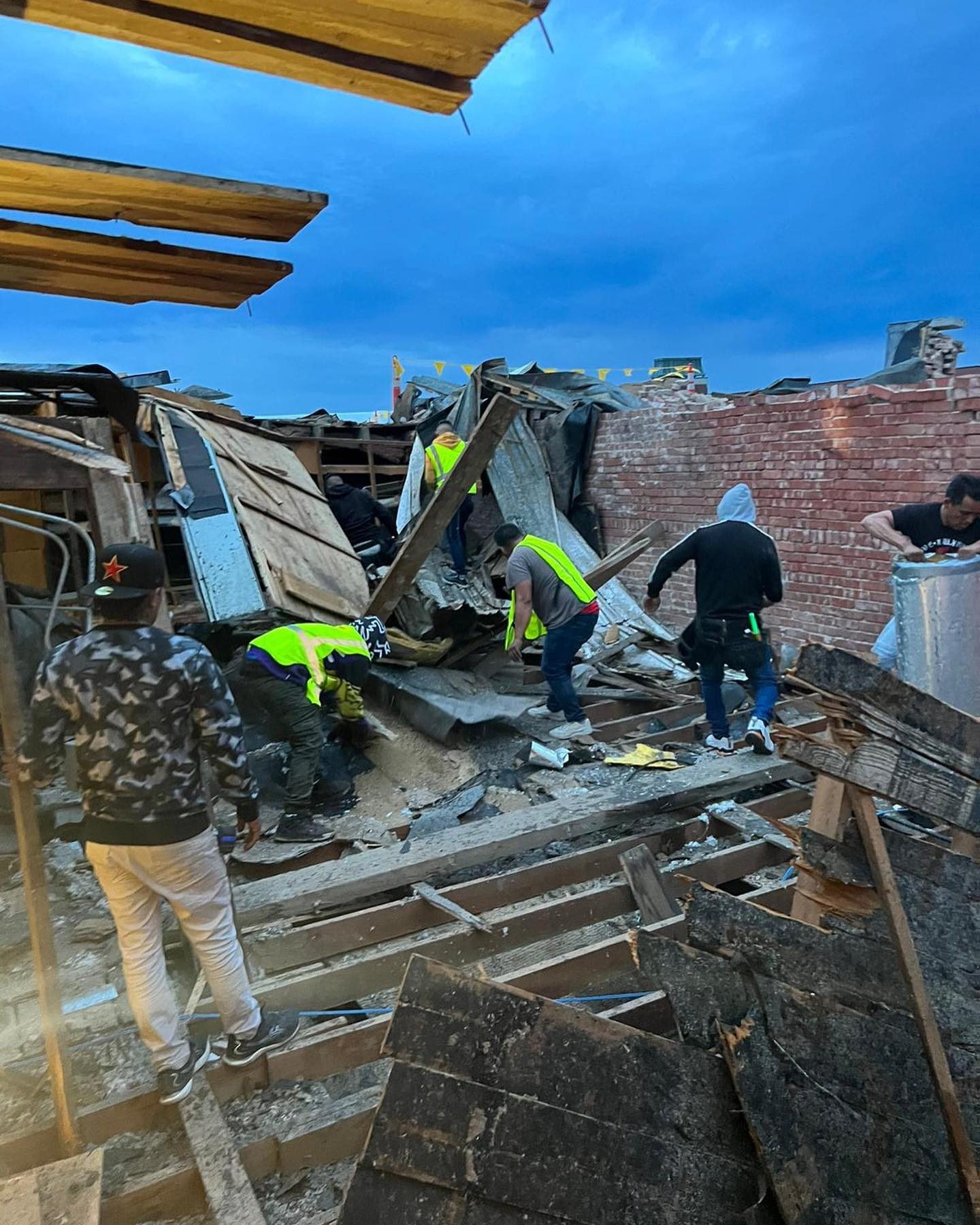 Crew clearing debris after a tornado