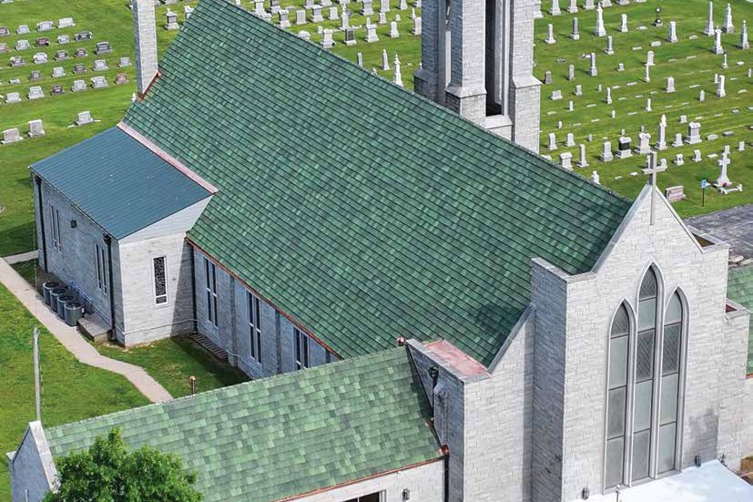 Trinity Lutheran Church in Freistatt, Missouri, with a new forest green clay tile roof