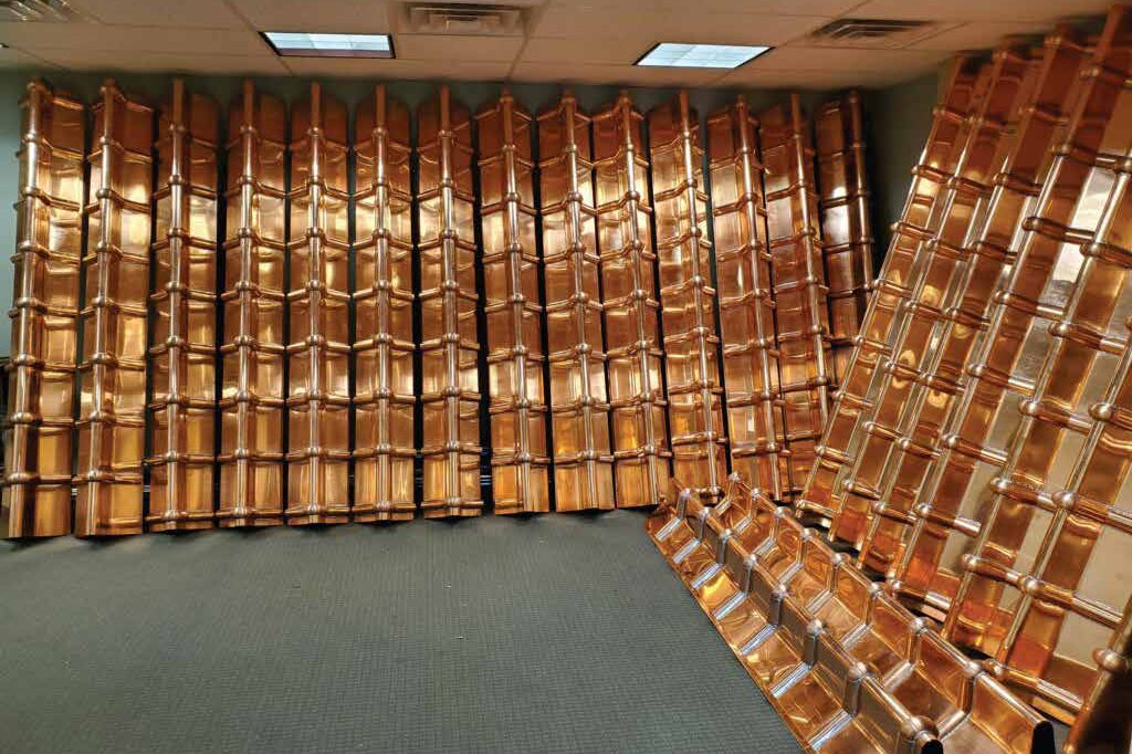 Hand-formed copper panels in Precision's shop