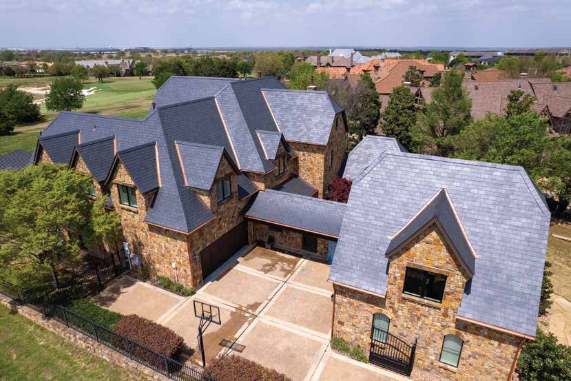 Stone estate with a grey slate roof