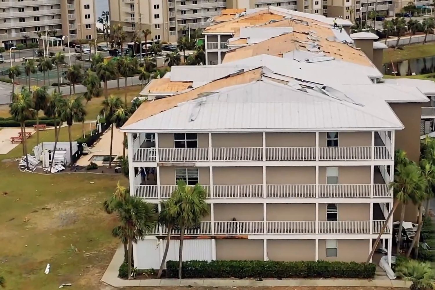 Grand Caribbean Condominiums with roofs torn off by Hurricane Sally, aerial view