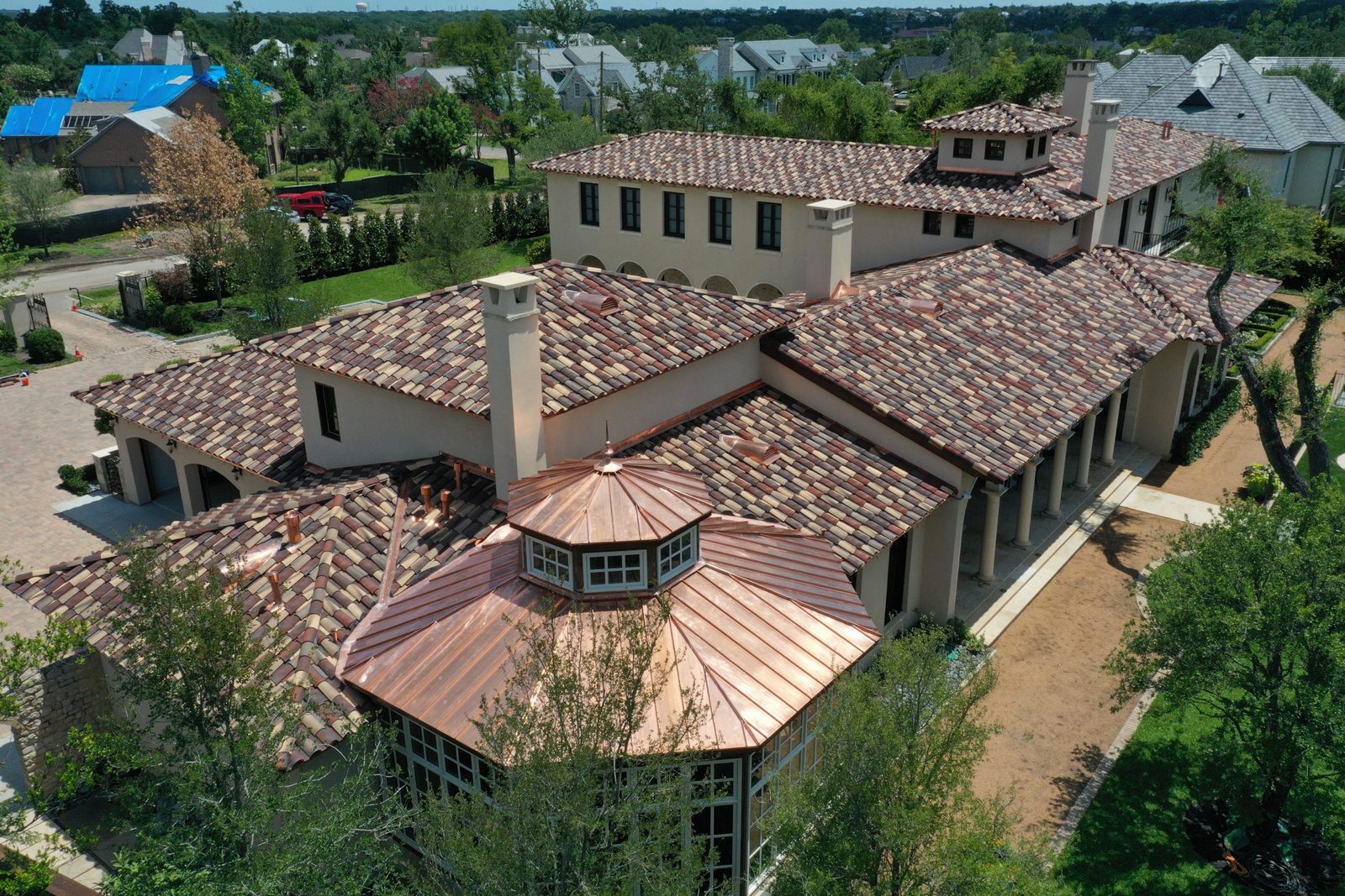 Preston Hollow estate in Dallas with a Ludowici clay tile roof and copper turret
