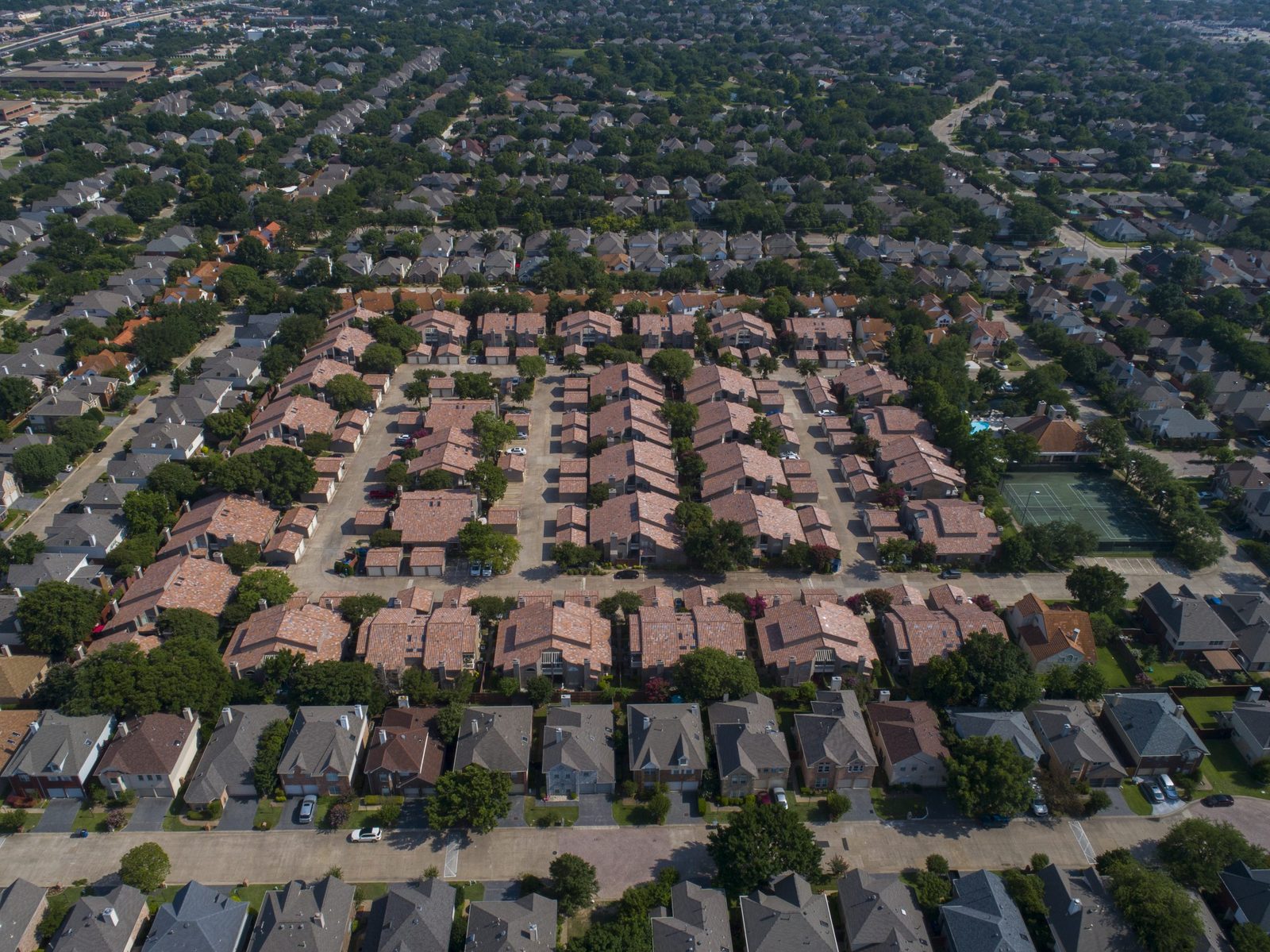The Villas of Capistrano community with new concrete tile roofs, aerial view