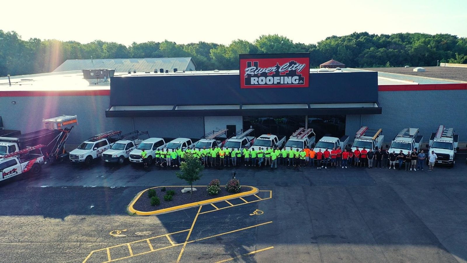 River City Roofing headquarters in Peoria with its truck fleet